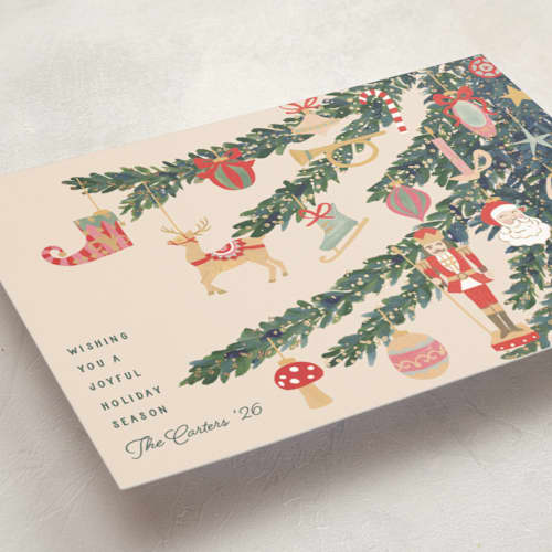 This is a champagne foil pressed holiday cards with foil pressed by Teju Reval called fun ornaments printing on signature in standard