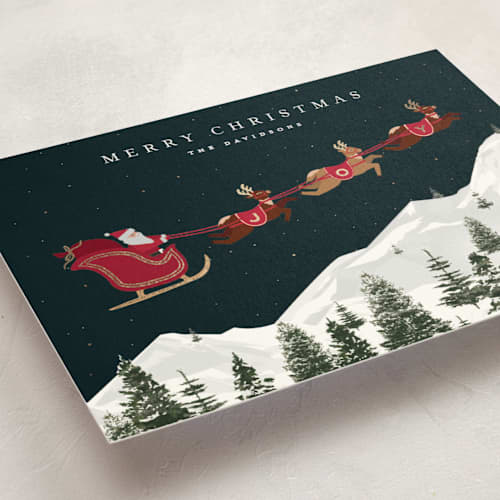 This is a poinsettia foil pressed holiday cards with foil pressed by Jennifer Lew called christmas eve printing on signature in standard