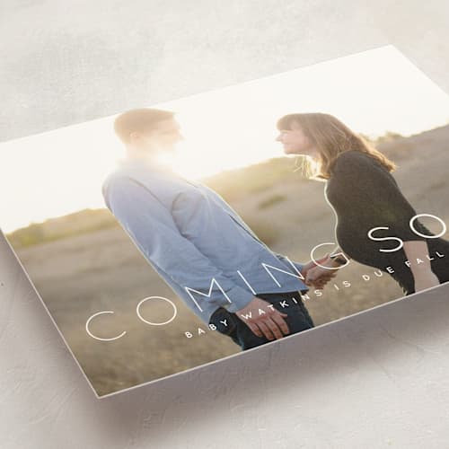 This is a cloud pregnancy announcements with standard by Roxy Cervantes called coming soon printing on signature in standard