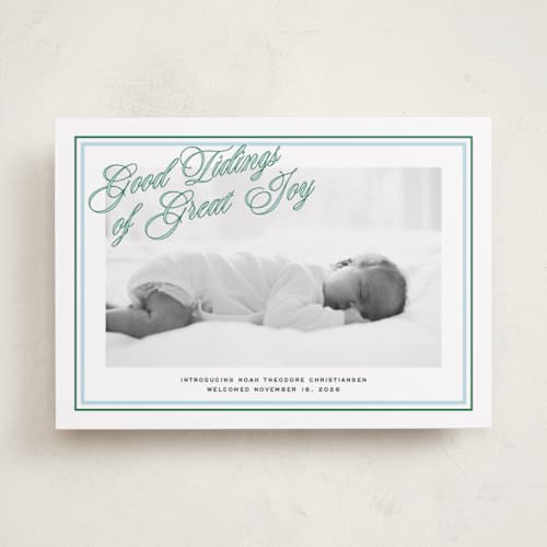 This is a powder babys first christmas with standard by Jenna Holcomb called joyous classic printing on recycled smooth signature in standard