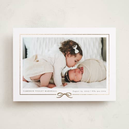 This is a cotton foil stamped birth announcements with foil pressed by Jessica Williams called ribbon wrap printing on recycled smooth signature in standard