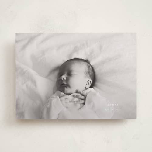 This is a linen birth announcements with standard by Ani Somi called sabine printing on recycled smooth signature in standard