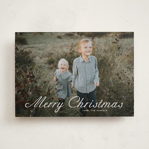 This is a powder photo christmas cards with standard by Carolyn MacLaren called outlined script printing on recycled smooth signature in standard