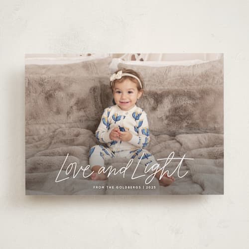 This is a ivory hanukkah cards with standard by Kristen Magee called scripty love and light printing on recycled smooth signature in standard