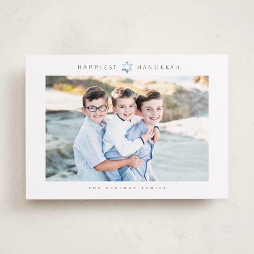 This is a sky hanukkah cards with standard by Maja Cunningham called happiest hannukah printing on recycled smooth signature in standard