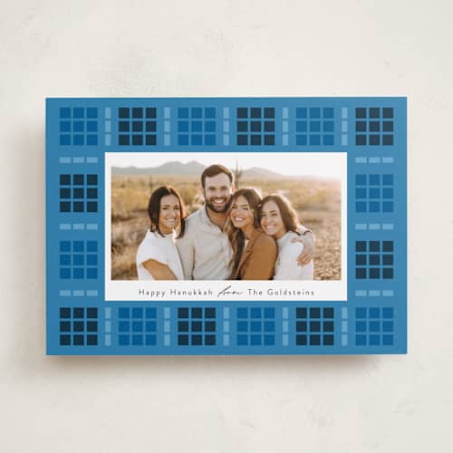 This is a cobalt hanukkah cards with standard by Morgan Kendall called geometric border printing on recycled smooth signature in standard