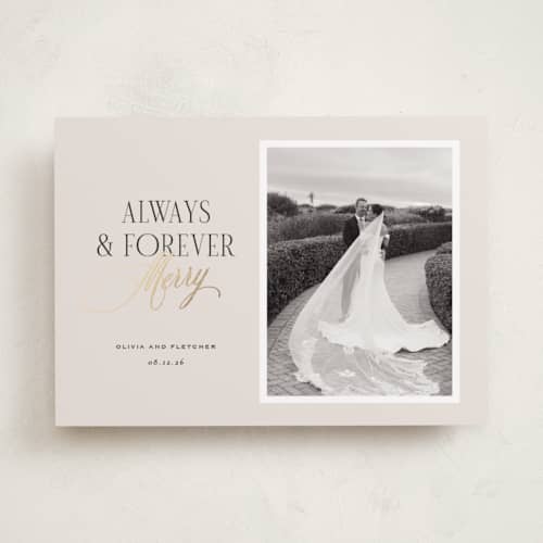 This is a cream foil pressed holiday cards with foil pressed by Sara Hicks Malone called always & forever printing on recycled smooth signature in standard