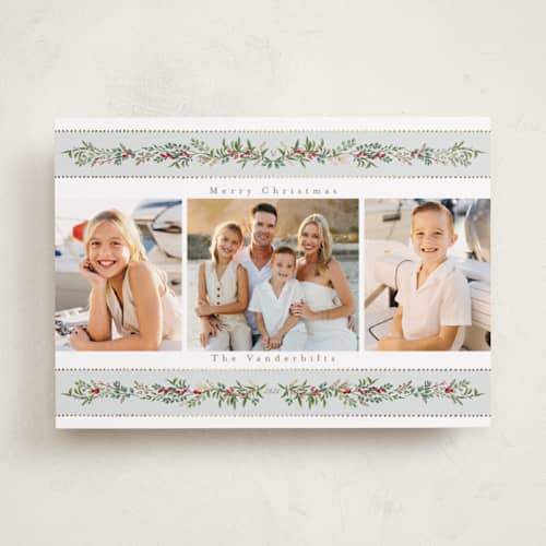 This is a holly berry foil pressed holiday cards with foil pressed by Susan Moyal called holiday ribbon printing on recycled smooth signature in standard
