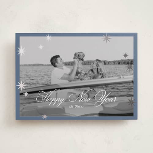 This is a dusty navy foil pressed holiday cards with foil pressed by AK Graphics called star sprinkle printing on recycled smooth signature in standard