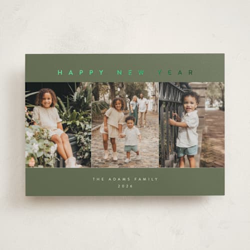 This is a pine needle foil pressed holiday cards with foil pressed by Pippa Shaw called trilogy printing on recycled smooth signature in standard