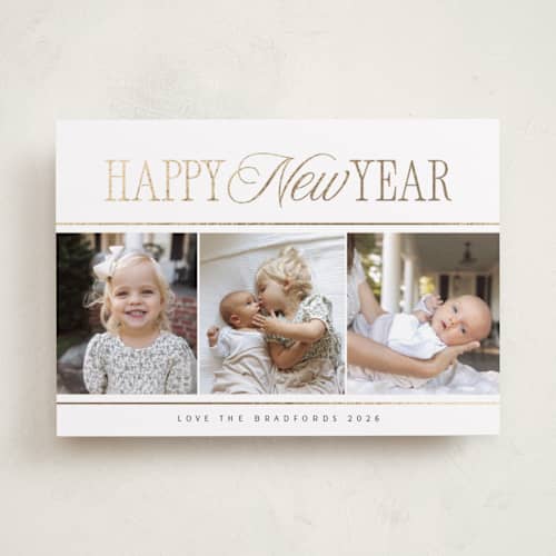 This is a snow foil pressed holiday cards with foil pressed by Nicole Walsh called new year trio printing on recycled smooth signature in standard