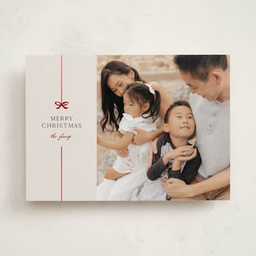 This is a poinsettia foil pressed holiday cards with foil pressed by Pixel and Hank called bow printing on recycled smooth signature in standard