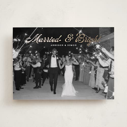 This is a snow foil pressed holiday cards with foil pressed by Annie Holmquist called married and bright printing on recycled smooth signature in standard