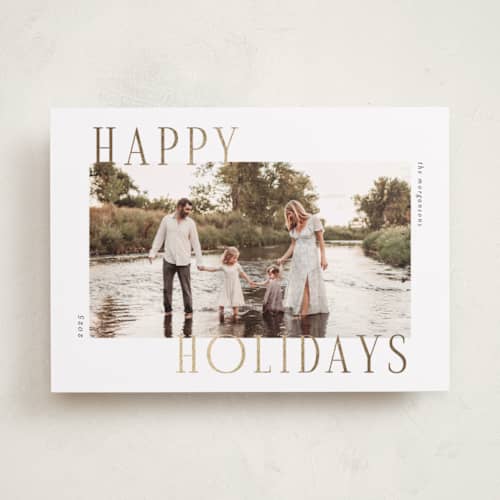 This is a snow foil pressed holiday cards with foil pressed by Chris Griffith called holiday wonder printing on recycled smooth signature in standard