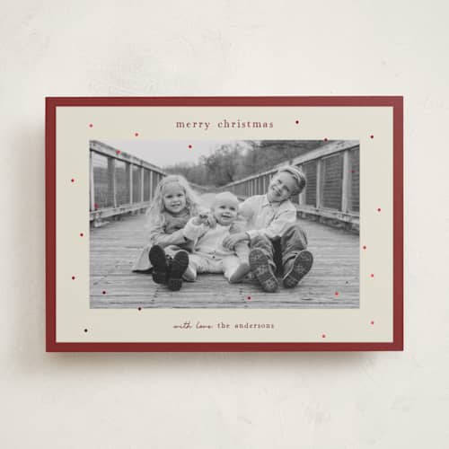 This is a poinsettia foil pressed holiday cards with foil pressed by Kelly Watkins called holiday sparkle printing on recycled smooth signature in standard