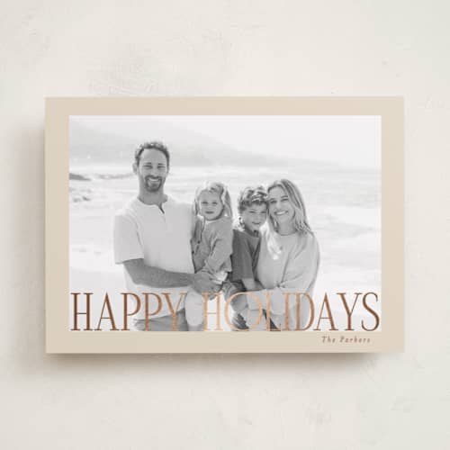 This is a ecru foil pressed holiday cards with foil pressed by Angela Thompson called happy holiday portrait printing on recycled smooth signature in standard