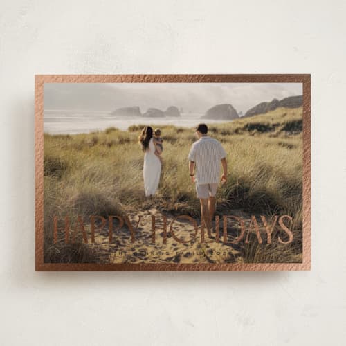 This is a cinder foil pressed holiday cards with foil pressed by Nicole Walsh called gilded edge printing on recycled smooth signature in standard