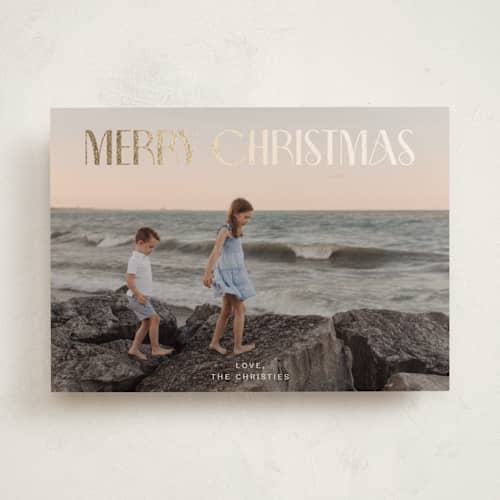 This is a cream foil pressed holiday cards with foil pressed by Ani Somi called sous le soleil printing on recycled smooth signature in standard