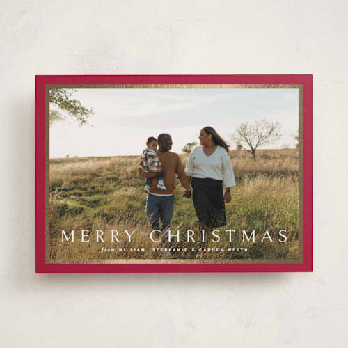 This is a poinsettia foil pressed holiday cards with foil pressed by Amy Kross called winds printing on recycled smooth signature in standard