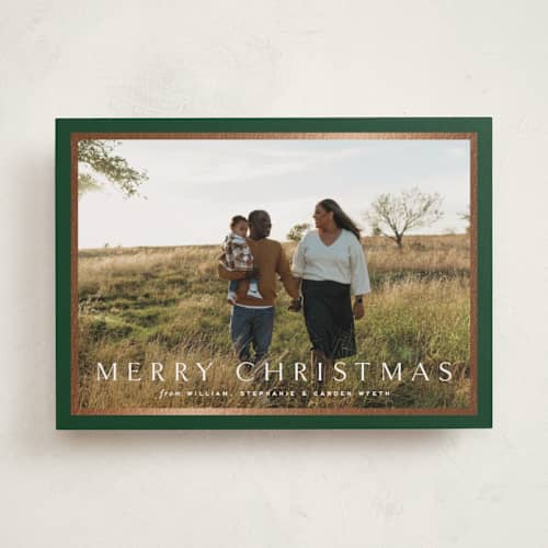 This is a pine foil pressed holiday cards with foil pressed by Amy Kross called winds printing on recycled smooth signature in standard