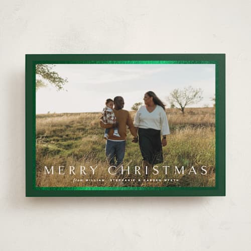 This is a pine foil pressed holiday cards with foil pressed by Amy Kross called winds printing on recycled smooth signature in standard