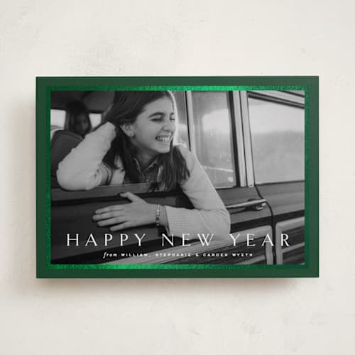 This is a pine foil pressed holiday cards with foil pressed by Amy Kross called winds printing on recycled smooth signature in standard