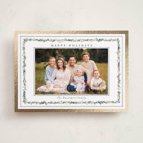 This is a blue spruce foil pressed holiday cards with foil pressed by Susan Moyal called delicate vine printing on recycled smooth signature in standard