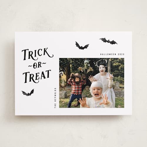 This is a onyx halloween party invitations cards with standard by Hooray Creative called trick-or-treat printing on recycled smooth signature in standard