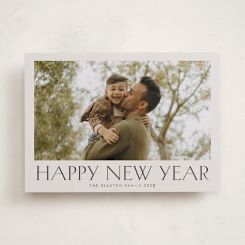 This is a parchment new year photo cards with standard by Nicole Walsh called headliner printing on recycled smooth signature in standard