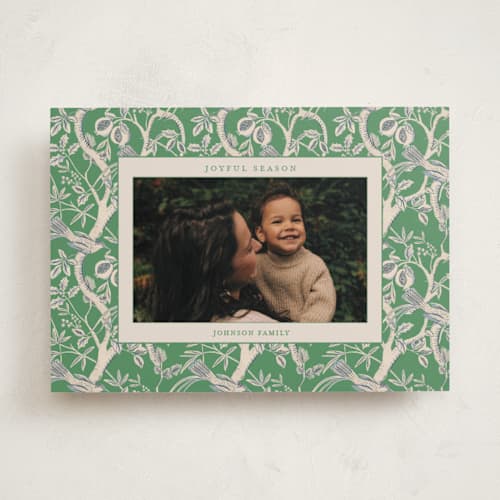 This is a forest holiday photo cards with standard by Sabrin Deirani called heritage pomegranate printing on recycled smooth signature in standard