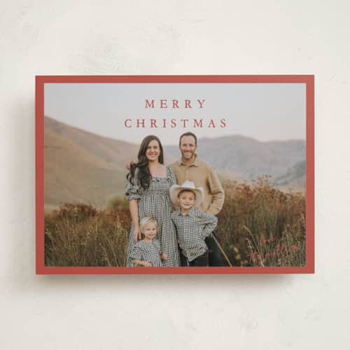This is a holly berry holiday photo cards with standard by Kasia Labocki called homebound printing on recycled smooth signature in standard