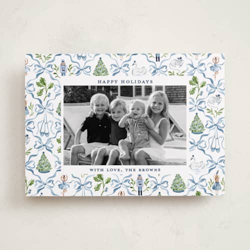 This is a blue ribbon holiday photo cards with standard by Sarah Knight called nutcracker ribbons printing on recycled smooth signature in standard