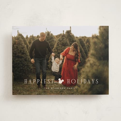 This is a cream holiday photo cards with standard by Pixel and Hank called disney's happiest mickey printing on recycled smooth signature in standard
