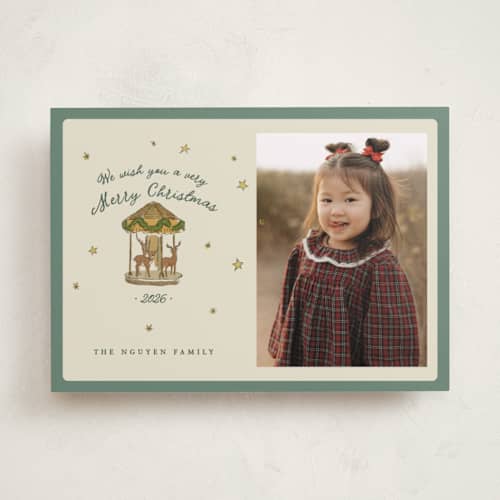 This is a pine holiday photo cards with standard by Bailamor Design by CM called carousel printing on recycled smooth signature in standard
