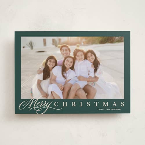 This is a wreath holiday photo cards with standard by Carolyn MacLaren called footnote printing on recycled smooth signature in standard