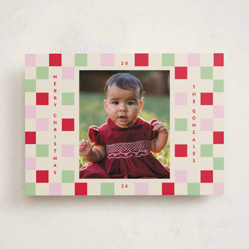This is a cranberry holiday photo cards with standard by Katie Zimpel called happy checkers printing on recycled smooth signature in standard