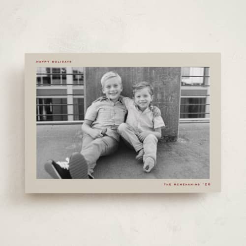 This is a holly holiday photo cards with standard by Grae called our merriest holidays printing on recycled smooth signature in standard