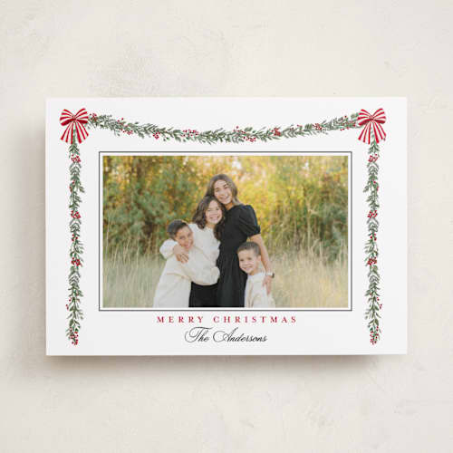 This is a candy cane holiday photo cards with standard by Susan Moyal called holly & bows printing on recycled smooth signature in standard