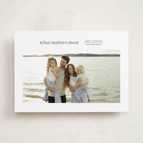 This is a spruce holiday photo cards with standard by Annie Clark called reflection printing on recycled smooth signature in standard