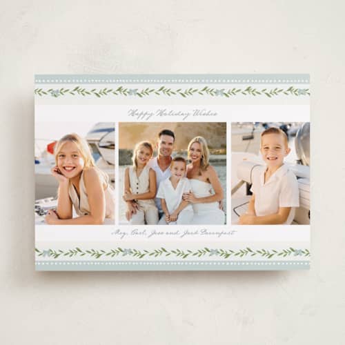 This is a coastal holiday photo cards with standard by Susan Moyal called holiday bows printing on recycled smooth signature in standard