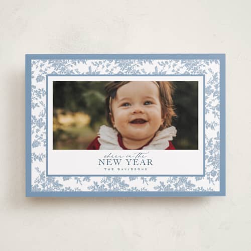 This is a powder holiday photo cards with standard by Jenna Holcomb called merry floral toile printing on recycled smooth signature in standard