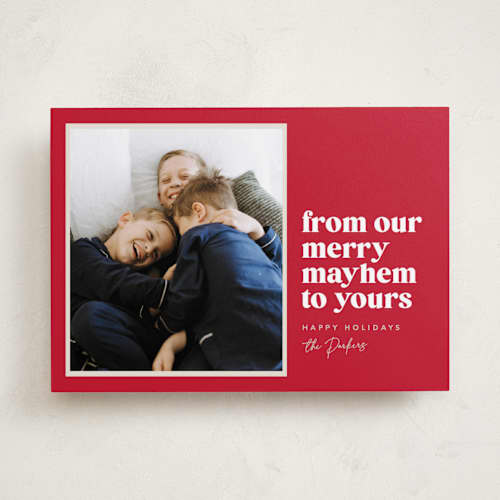 This is a holly berry holiday photo cards with standard by Robert and Stella called our merry mayhem printing on recycled smooth signature in standard