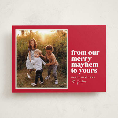 This is a holly berry holiday photo cards with standard by Robert and Stella called our merry mayhem printing on recycled smooth signature in standard
