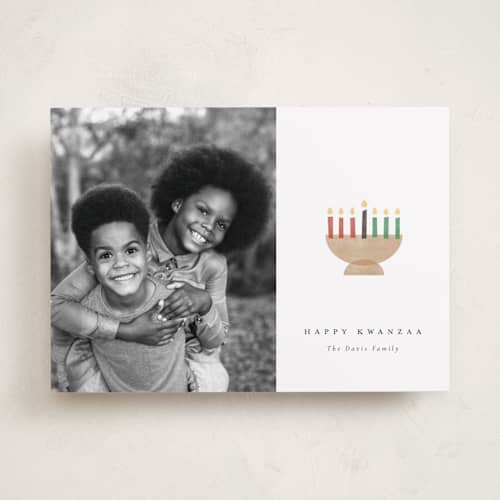 This is a linen kwanzaa cards with standard by Robert and Stella called mod candles printing on recycled smooth signature in standard