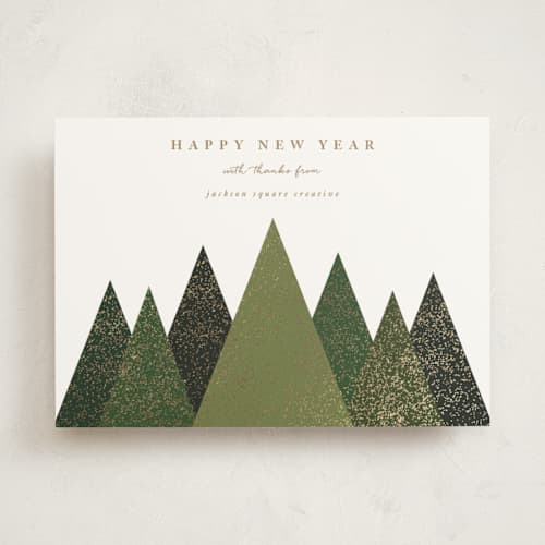 This is a fir business holiday cards with foil pressed by Roopali called shimmering christmas trees printing on signature in standard