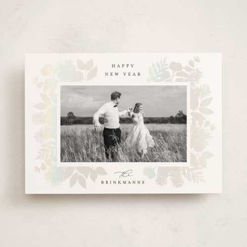 This is a snow gloss press holiday cards with gloss press by Brooke Chandler called joy greenery printing on signature in standard