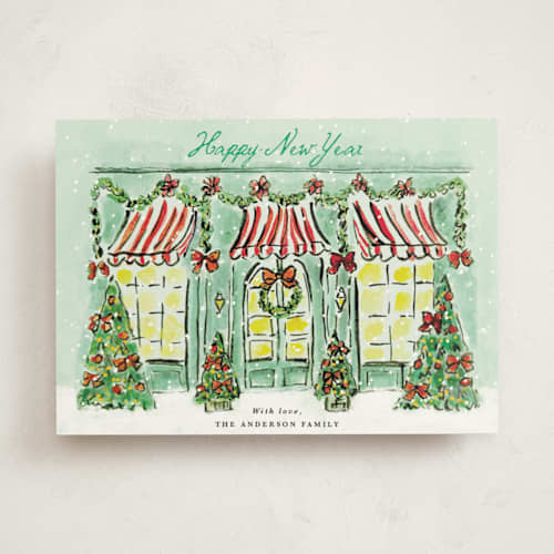 This is a frosted mint non photo holiday cards with standard by Cass Loh called the jolly storefront printing on signature in standard