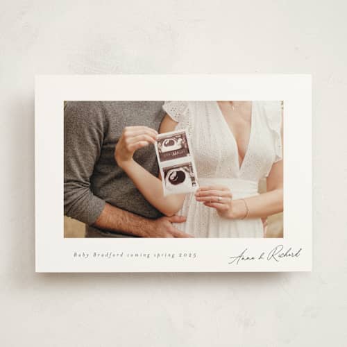 This is a moon pregnancy announcements with standard by Nicole Walsh called signed by us printing on signature in standard