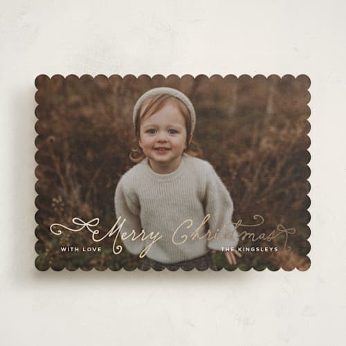 This is a marshmallow foil pressed holiday cards with foil pressed by Heather Schertzer called darling printing on recycled smooth signature in standard
