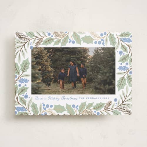 This is a bluebelle foil pressed holiday cards with foil pressed by Kristen Smith called gilded holly border printing on recycled smooth signature in standard